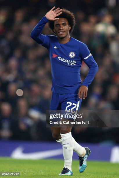 Willian of Chelsea celebrates after scoring his sides first goal during the Carabao Cup Quarter-Final match between Chelsea and AFC Bournemouth at...