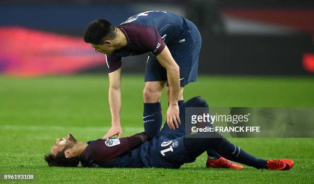 Paris Saint-Germain's Brazilian forward Neymar reacts following an injury during the French L1 football match between Paris Saint-Germain and Caen at...