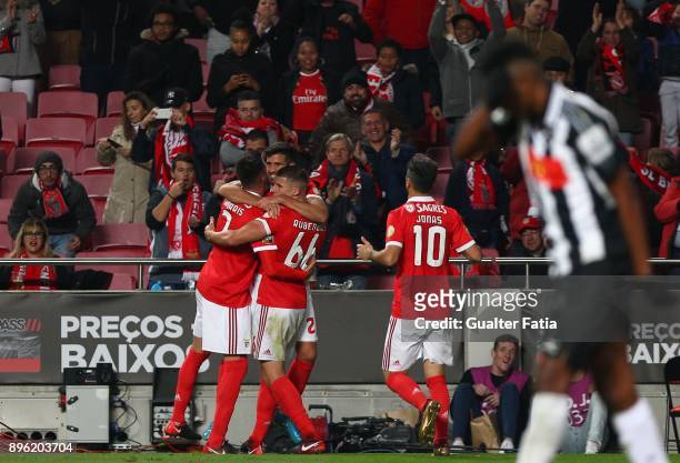 Benfica defender Lisandro Lopez from Argentina celebrates with teammates after scoring a goal during the Portuguese League Cup match between SL...