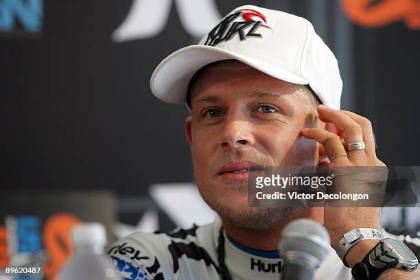 Men's runner-up Mick Fanning looks on during the post-contest press conference after coming in second to Brett Simpson in the Men's Final during the...