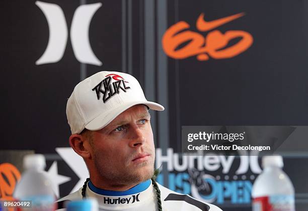 Men's runner-up Mick Fanning looks on during the post-contest press conference after coming in second to Brett Simpson in the Men's Final during the...