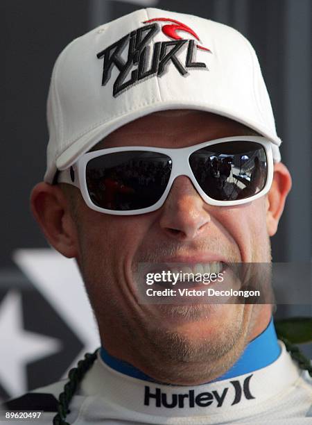 Men's runner-up Mick Fanning laughs during the post-contest press conference after coming in second to Brett Simpson in the Men's Final during the...