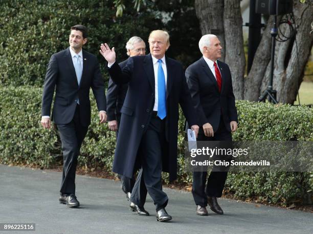 President Donald Trump , House Speaker Paul Ryan , Senate Majority Leader Mitch McConnell and Vice President Mike Pence make their way to a news...