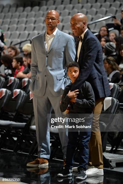 Monty Williams and Bruce Bowen look on before the LA Clippers game against the San Antonio Spurs on December 18, 2017 at the AT&T Center in San...