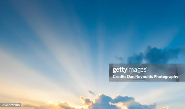 clouds and sky with sun beam's - morning sky stock-fotos und bilder