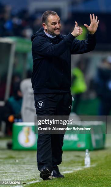 Timo Head coach Frank Schmidt of Heidenheim reacts during the DFB Cup match between 1. FC Heidenheim and Eintracht Frankfurt at Voith-Arena on...