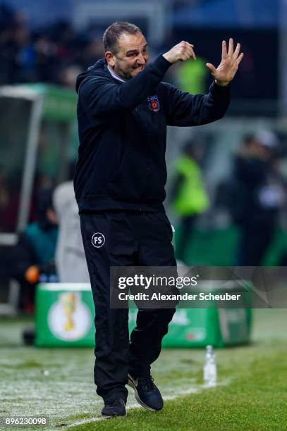 Timo Head coach Frank Schmidt of Heidenheim reacts during the DFB Cup match between 1. FC Heidenheim and Eintracht Frankfurt at Voith-Arena on...