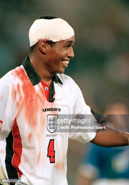 Paul Ince of England celebrates qualification for the 1998 FIFA World Cup in France after securing a draw in the last qualifier between Italy and...
