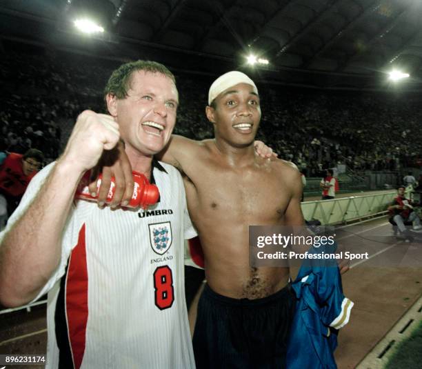 Paul Ince and Paul Gascoigne of England celebrate qualification for the 1998 FIFA World Cup in France after securing a draw in the last qualifier...