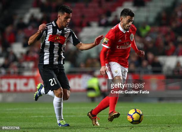 Benfica forward Pizzi from Portugal with Portimonense SC midfielder Pedro Sa from Portugal in action during the Portuguese League Cup match between...
