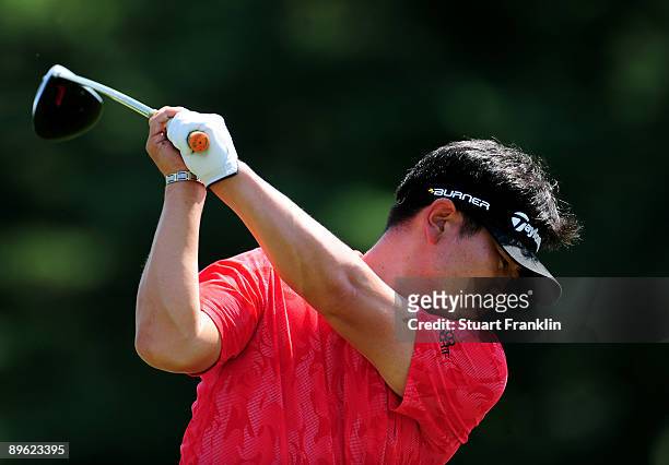 Yang of South Korea plays a tee shot during a practice round of the World Golf Championship Bridgestone Invitational on August 5, 2009 at Firestone...