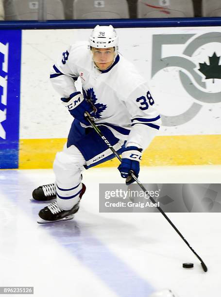 Colin Greening of the Toronto Marlies controls the puck against the Manitoba Moose during AHL game action on December 17, 2017 at Ricoh Coliseum in...