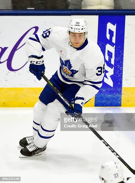 Colin Greening of the Toronto Marlies controls the puck against the Manitoba Moose during AHL game action on December 17, 2017 at Ricoh Coliseum in...