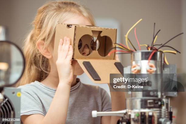 ingenieur - child with robot stockfoto's en -beelden