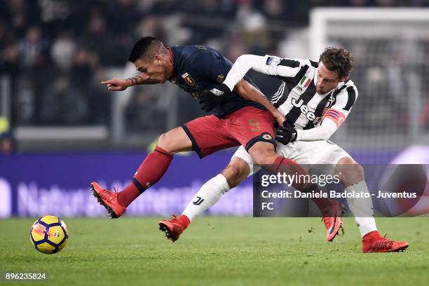 Claudio Marchisio of Juventus competes for the ball with Ricardo Centurion of Genoa CFC during the TIM Cup match between Juventus and Genoa CFC at...