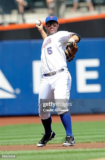 David Wright of the New York Mets warms up before the game against the Colorado Rockies at Citi Field on July 30, 2009 in New York, New York.