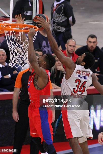 Cory Higgins, #22 of CSKA Moscow competes with Hollis Thompson, #34 of Olympiacos Piraeus during the 2017/2018 Turkish Airlines EuroLeague Regular...