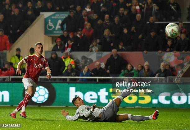 Joe Bryan of Bristol City scores his sides first goal during the Carabao Cup Quarter-Final match between Bristol City and Manchester United at Ashton...