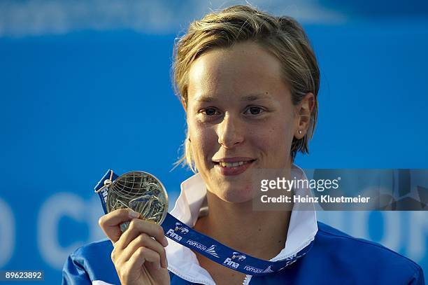 13th FINA World Championships: Closeup of Italy Federica Pellegrini victorious with gold medal after Women's 200M Freestyle Final at Foro Italico....