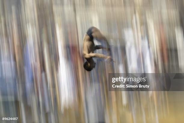 10th FINA World Championships: North Korea Yong Kyong in action during Men's 10M Platform Semifinals at Piscina Municipal de Montjuic. Blur....