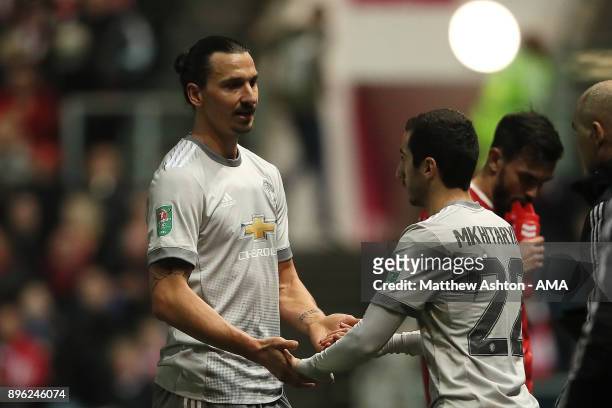 Zlatan Ibrahimovic of Manchester United is substituted for Henrikh Mkhitaryan during the Carabao Cup Quarter-Final match between Bristol City and...