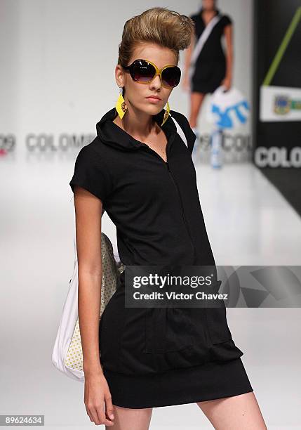 Model walks the runway wearing Universidad del Area Andina during the 3rd day of Colombia Moda 2009 at Plaza Mayor on July 29, 2009 in Medellin,...