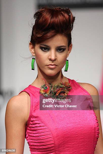 Model walks the runway wearing Universidad del Area Andina during the 3rd day of Colombia Moda 2009 at Plaza Mayor on July 29, 2009 in Medellin,...