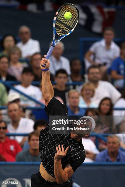 Andy Roddick serves against Benjamin Becker of Germany during Day 3 of the Legg Mason Tennis Classic at the William H.G. FitzGerald Tennis Center...