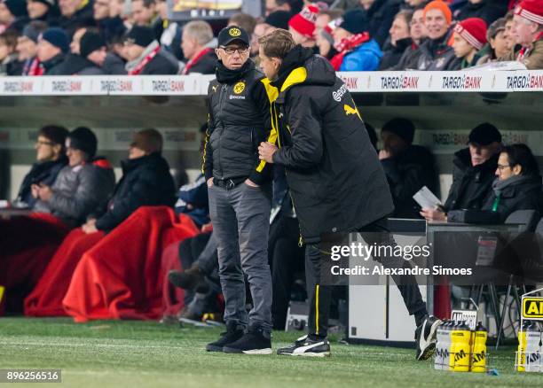 Head coach Peter Stoeger of Borussia Dortmund together with his assistant coach Joerg Heinrich during to the DFB Cup match between Bayern Muenchen...