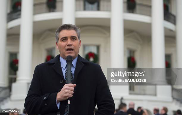 Jim Acosta, Senior White House Correspondent for CNN, speaks on camera after US President Donald Trump held an event about the passage of tax reform...