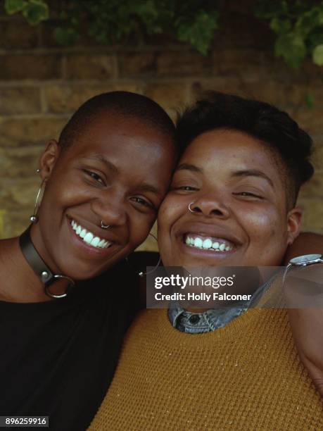 queer friendship, london - arm around stock pictures, royalty-free photos & images