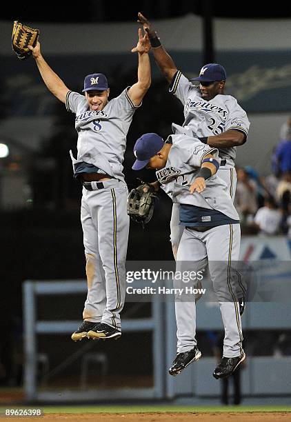 Ryan Braun, Mike Camron, and Jody Gerut of the Milwaukee Brewers celebrate a 4-1 victory over the Los Angeles Dodgers at Dodger Stadium on August 5,...