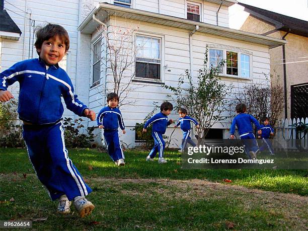 boy runs around with his clones - double exposure running stock-fotos und bilder