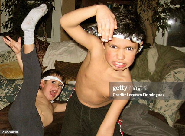 two boys pretend to be samurai warriors - seven samurai stock-fotos und bilder