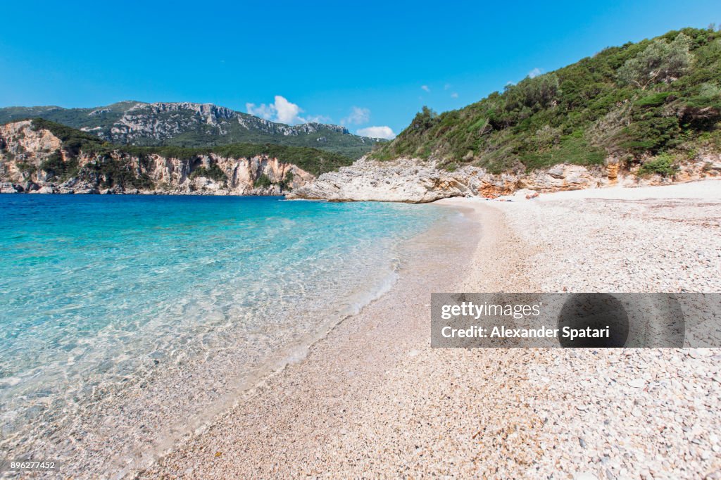 Secluded Rovinia beach in Liapades village, Corfu, Greece