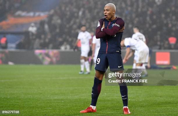 Paris Saint-Germain's French forward Kylian MBappe celebrates his goal during the French L1 football match between Paris Saint-Germain and Caen at...
