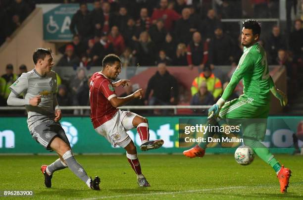 Korey Smith of Bristol City scores his sides second goal past Sergio Romero of Manchester United during the Carabao Cup Quarter-Final match between...