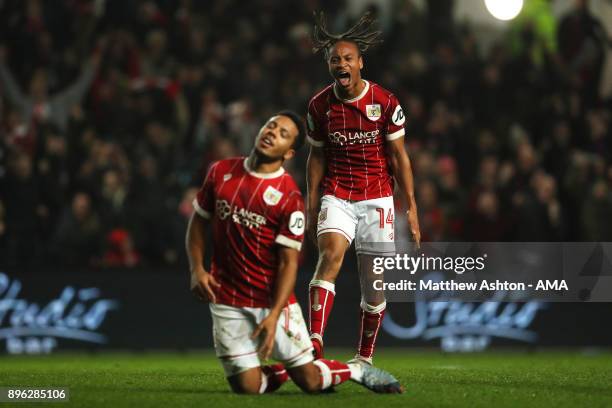 Korey Smith of Bristol City celebrates scoring a goal to make it 2-1 with Bobby Reid during the Carabao Cup Quarter-Final match between Bristol City...