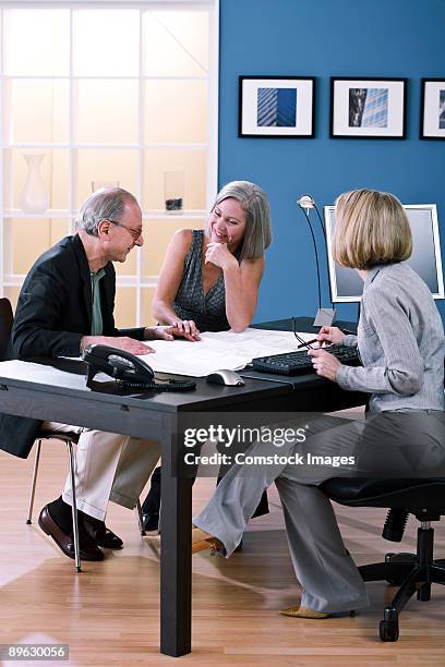 home office business meeting - legs crossed at knee stock pictures, royalty-free photos & images