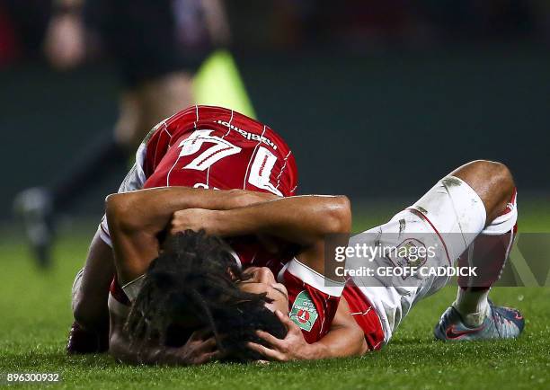 Bristol City players celebrate their victory after the English League Cup quarter-final football match between Bristol City and Manchester United at...