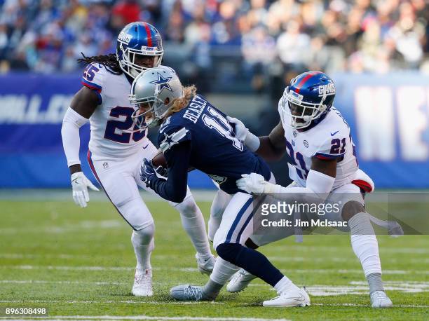 Cole Beasley of the Dallas Cowboys in action against Brandon Dixon and Landon Collins of the New York Giants on December 10, 2017 at MetLife Stadium...