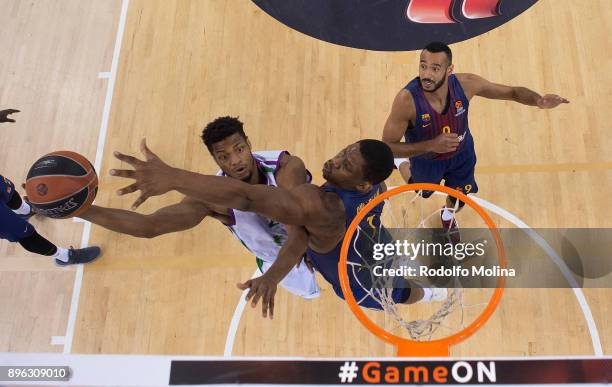 Jeff Brooks, #23 of Unicaja Malaga competes with Kevin Seraphine, #1 of FC Barcelona Lassa during the 2017/2018 Turkish Airlines EuroLeague Regular...