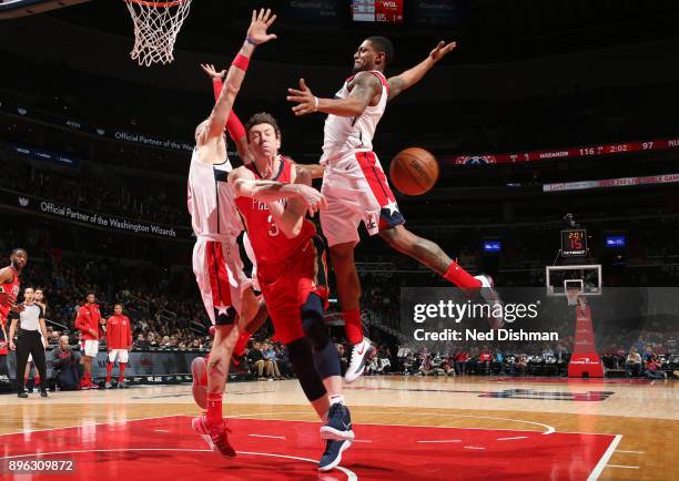 Omer Asik of the New Orleans Pelicans passes the ball during the game against the Washington Wizards on December 19, 2017 at Capital One Arena in...