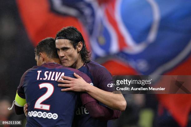 Edinson Cavani of Paris Saint-Germain is congratulated by teammate Thiago Silva after scoring during the Ligue 1 match between Paris Saint Germain...