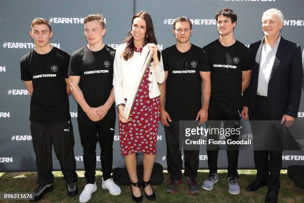 Prime Minister Jacinda Ardern with the Queens Baton and some of the selected mens gymnastics team with Auckland Mayor Phil Goff during the Queens...