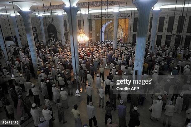 Bangladeshi Muslims pray during a special night prayer at the National Mosque of Bangladesh to mark Shab-e-Barat or 'night of forgiveness' in Dhaka...