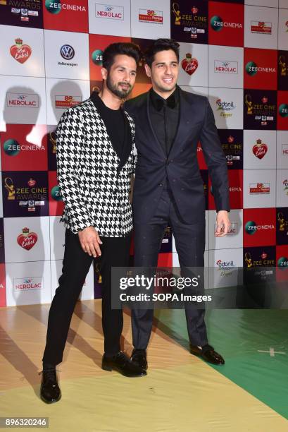 Indian film actor Shahid Kapoor and Sidharth Malhotra attend the Red carpet event of Zee Cine Awards 2018 at MMRDA Ground, Bandra in Mumbai.