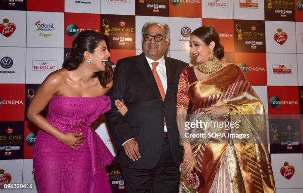 Indian film actress Priyanka Chopra, Bony Kapoor and Sridevi attend the Red carpet event of Zee Cine Awards 2018 at MMRDA Ground, Bandra in Mumbai.