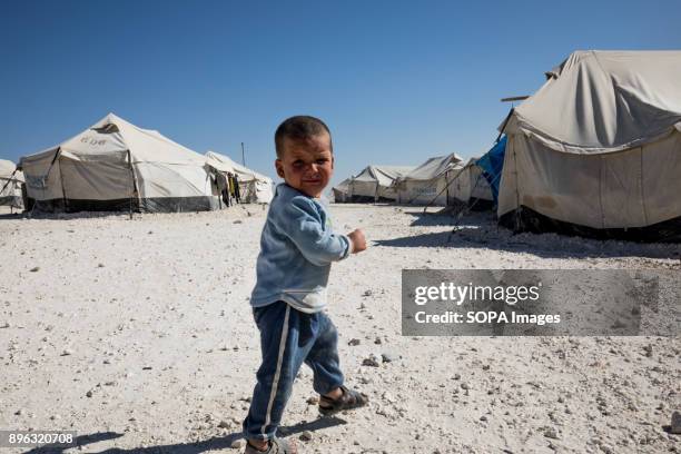 Kid cries desperately while he looks for his mother in Ain Issa refugee camp in Syria. The Syrian civil war has been carried on for more than years...