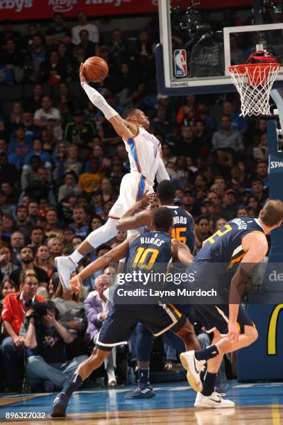 Russell Westbrook of the Oklahoma City Thunder dunks against the Utah Jazz on December 20, 2017 at Chesapeake Energy Arena in Oklahoma City,...